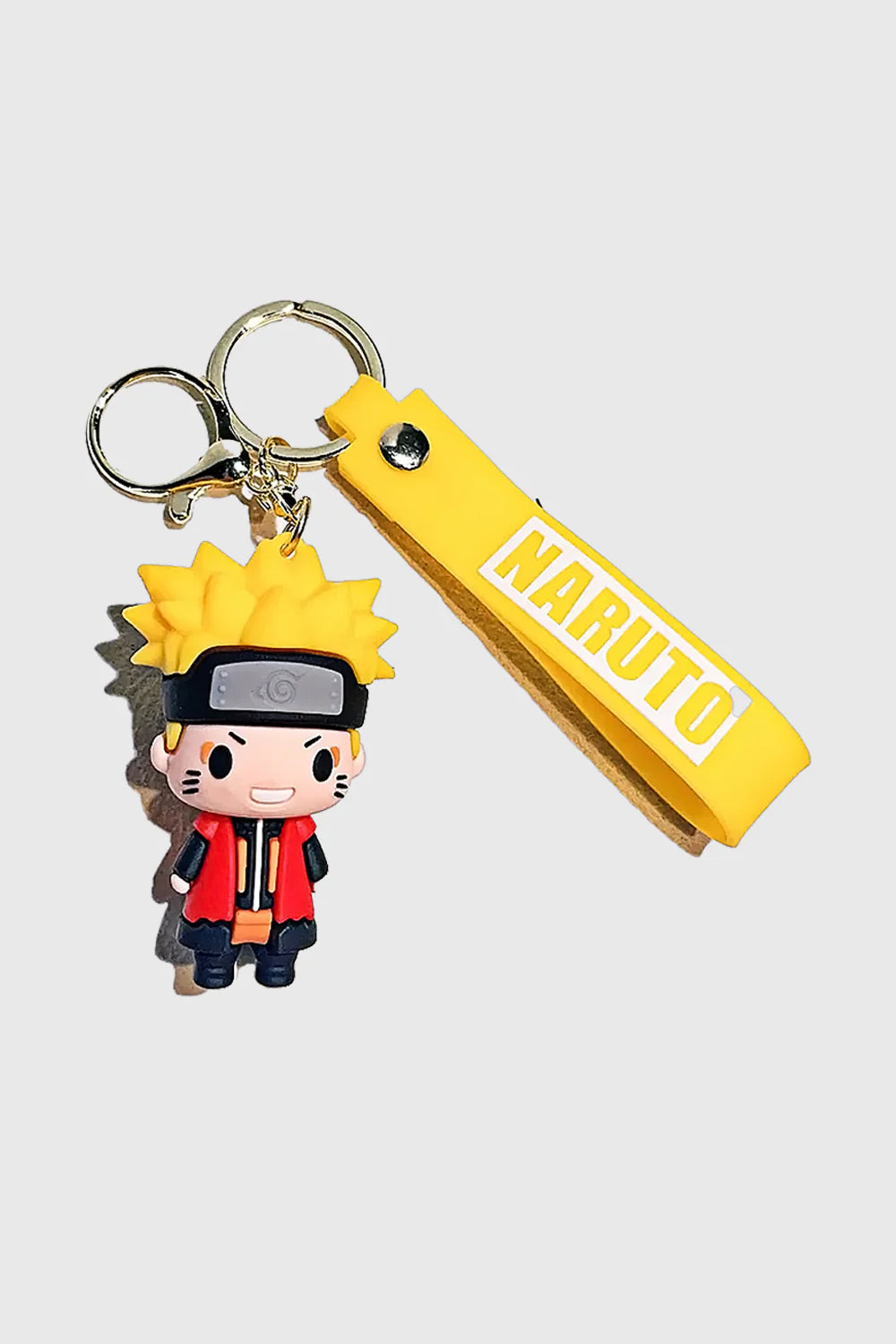 Show off your ninja spirit with this Naruto Uzumaki 3D PVC Keychain, featuring Naruto in his signature cloak and headband. Made from durable, high-quality PVC, this lightweight and stylish keyring includes a matching yellow "Naruto" wrist strap for extra